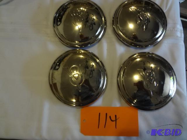 lot 114 image: 1934 Ford Hubcaps...