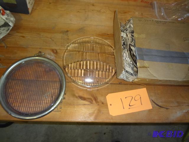 lot 129 image: Pair of Head lights lenses 33-4 Ford, 32 lens...