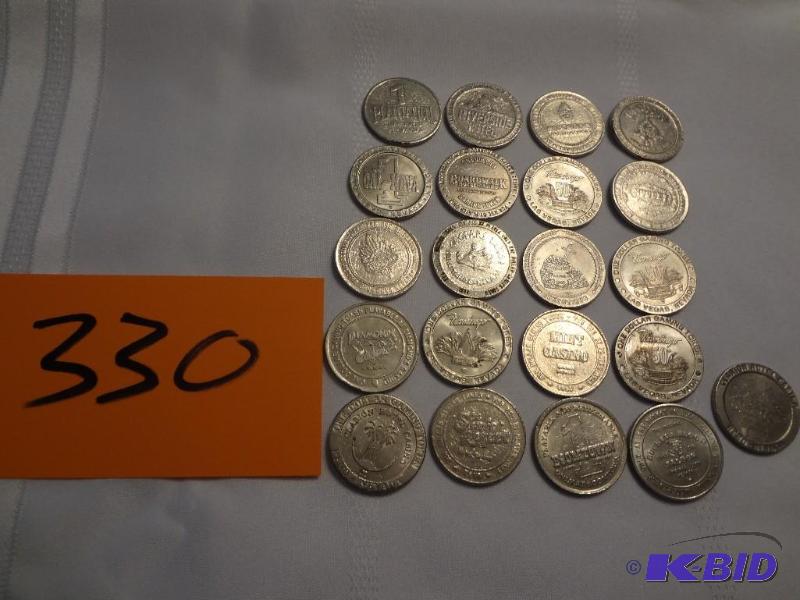 lot 330 image: (21) $1.00 Gaming Tokens from various Venues...