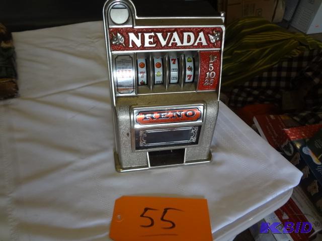lot 55 image: Small Slot Machine Bank, works, excellent con...