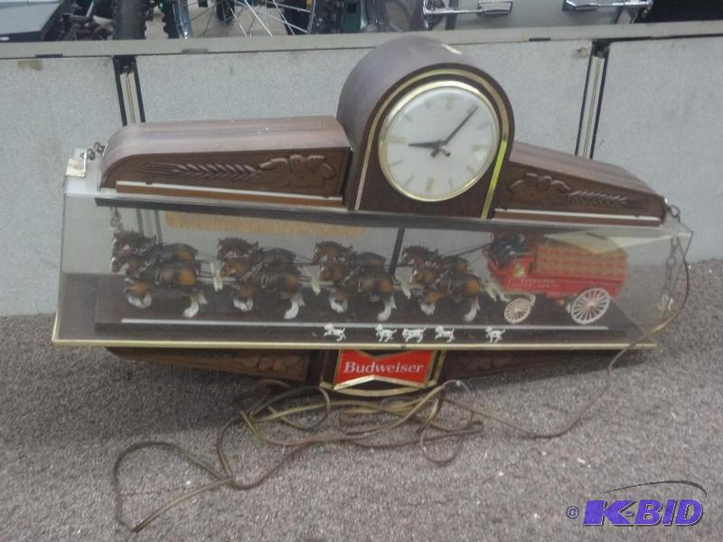 lot 100 image: Budweiser Lighted Clock Sign...