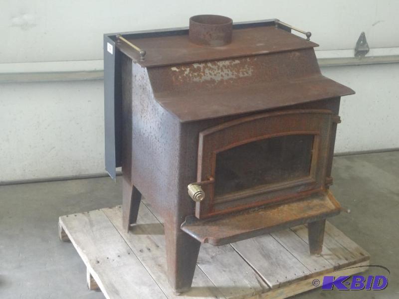 lot 12 image: Heavy Duty Cast Iron Wood Stove With Glass Fr...
