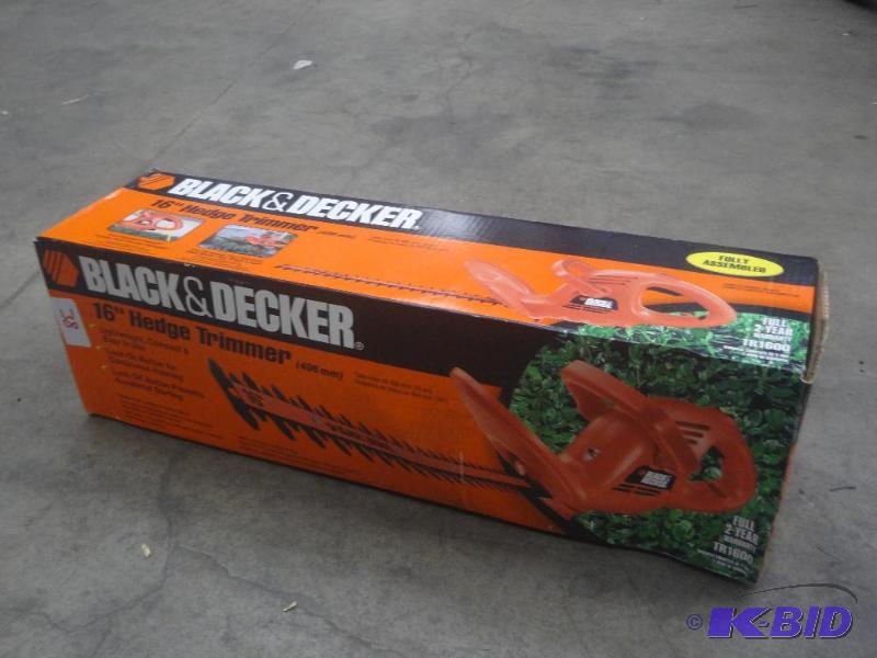 lot 38 image: Black & Decker 16" Electric Hedge Tr...