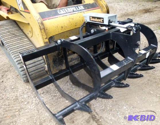 lot 7 image: Tomahawk Brand Universal Mount Bobcat Skid Lo...