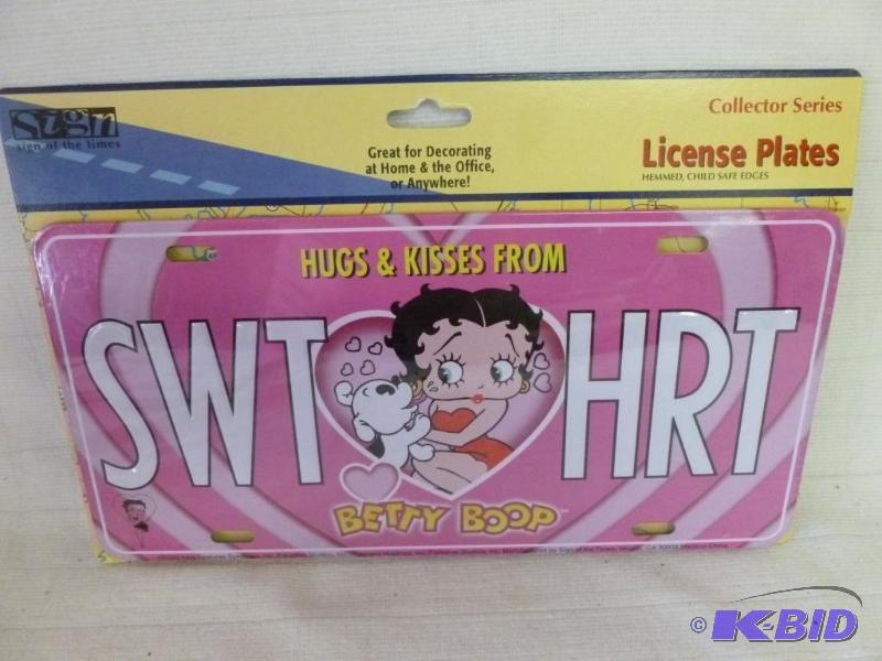 lot 104 image: Collectible Betty Boop embossed metal license...