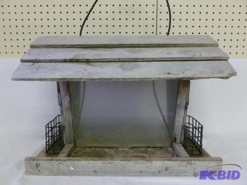 lot 123 image: Large wooden flip lid top bird feeder that me...