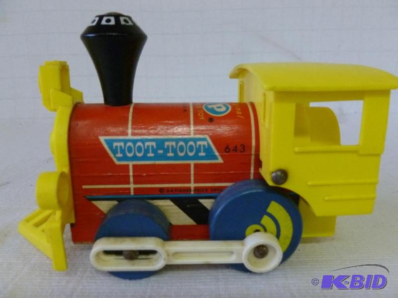 lot 134 image: Vintage 1964 Fisher Price Toot-Toot Train, go...