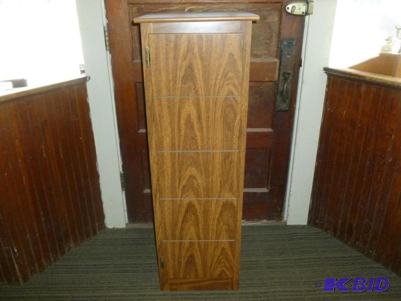 lot 15 image: Wooden single door 3-tier storage cabinet tha...