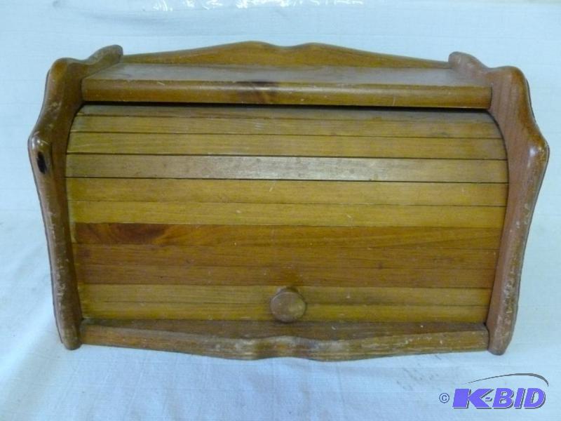 lot 180 image: Solid wood roll top bread box that measures 9...