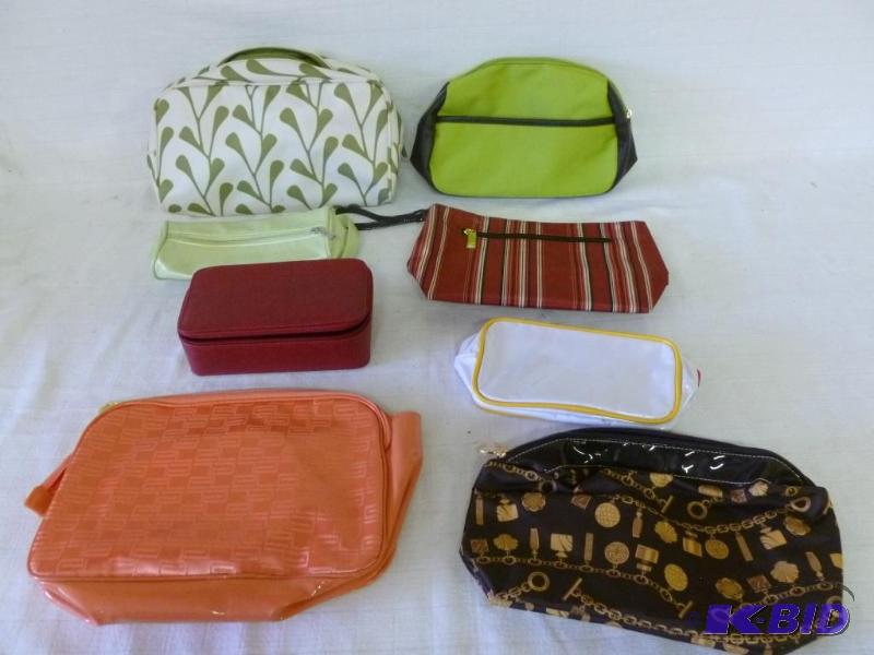 lot 182 image: Lot of seven purses or makeup bags, Estee Lau...