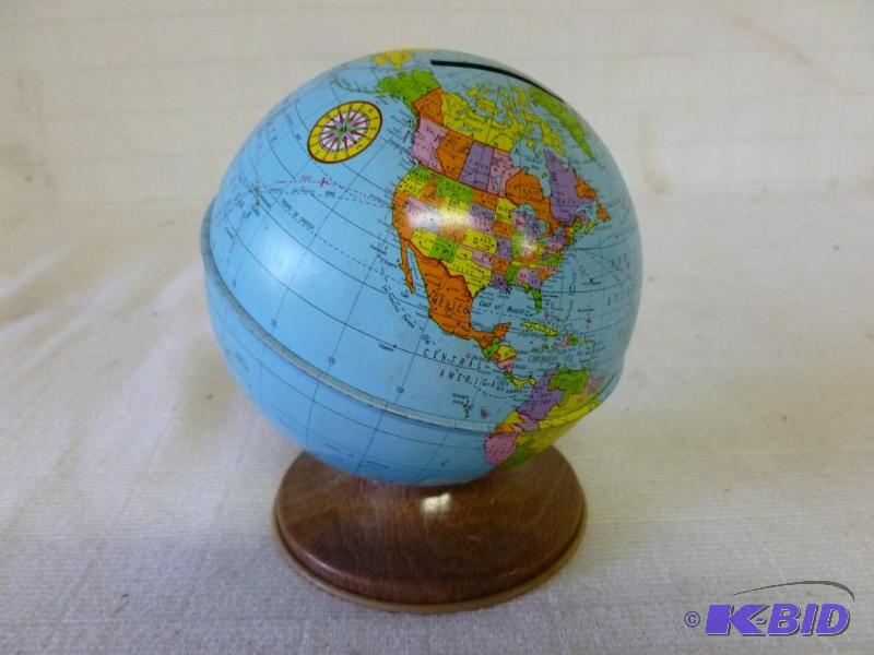 lot 186 image: Vintage Ohio Art metal globe coin bank that m...
