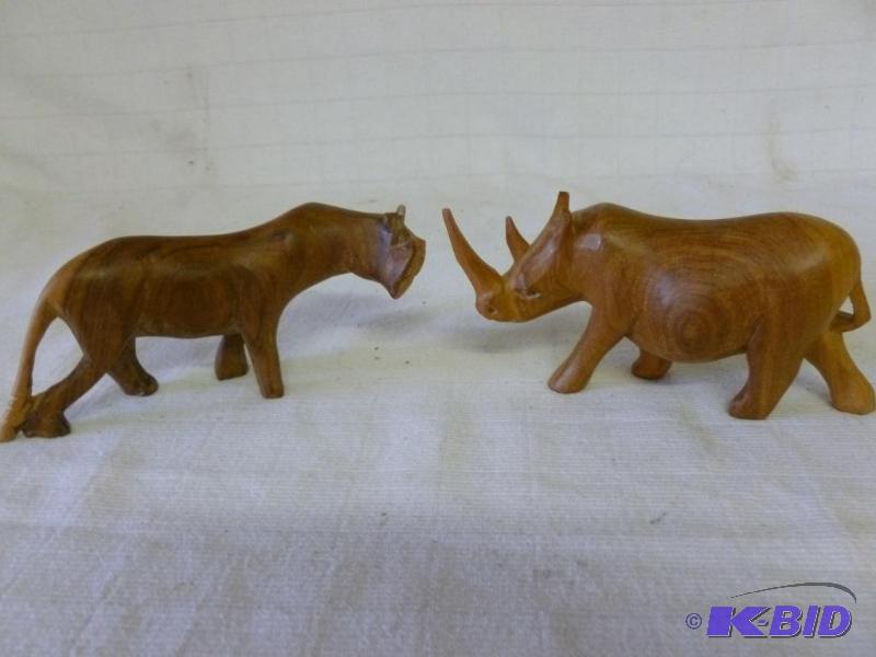 lot 195 image: Lot of two hand carved wooden animal figurine...