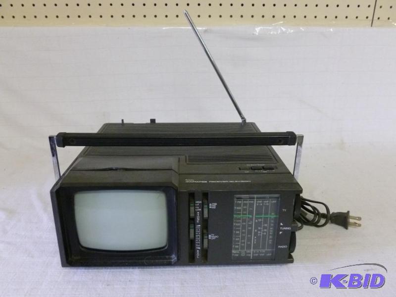 lot 215 image: Sears AMFM portable radio T.V, good setup fo...