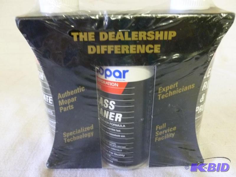 lot 234 image: Mopar 3pc. cleaning kit that includes a bottl...