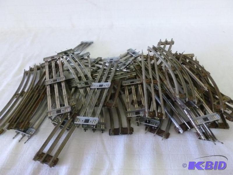 lot 251 image: Large lot of vintage 027 train track....