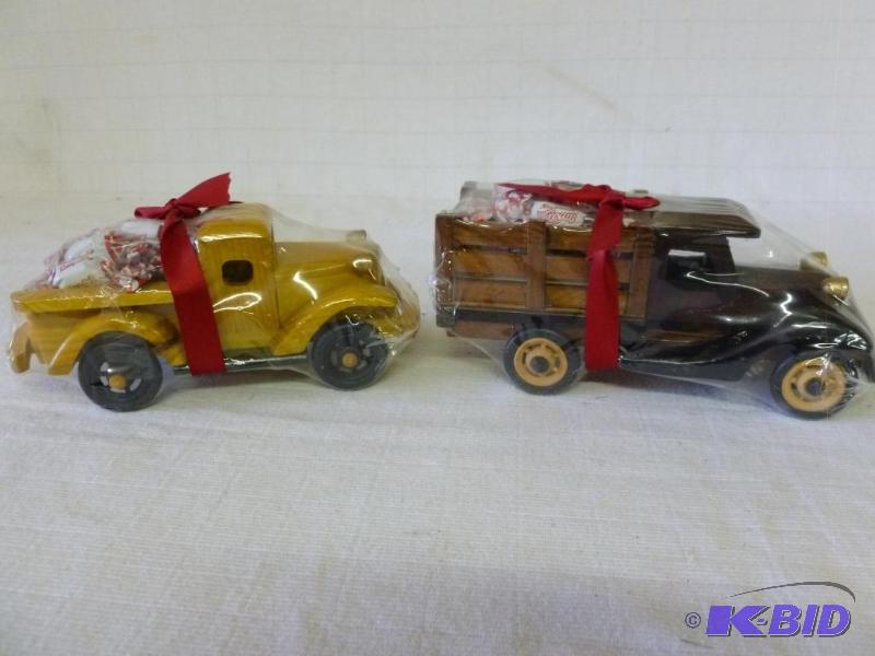 lot 299 image: Lot of two wooden mantle trucks that measure ...