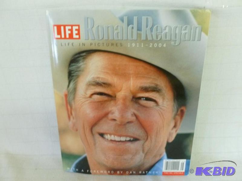 lot 37 image: Book - Ronald Reagan A Life In Pictures 1911-...