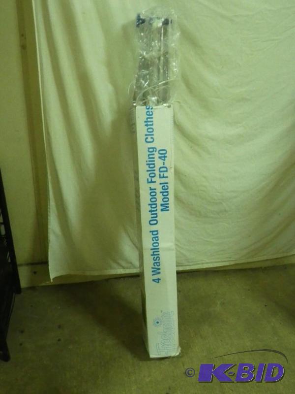 Outdoor folding clothesline, slightly bent...