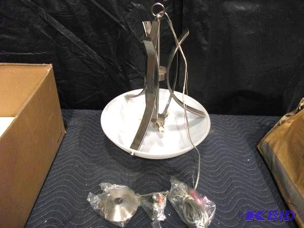 lot 16 image: Hanging Light Fixture   Appears to be new ...