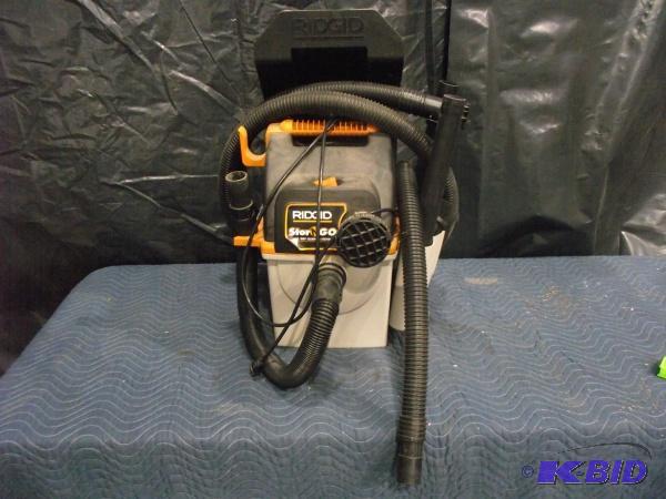 lot 20 image: Rigid Store and Go Shop Vac   Mounts to the w...