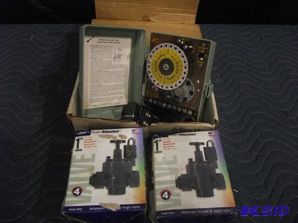 lot 51 image: Sprinkler Timer and (2) Water Valves...