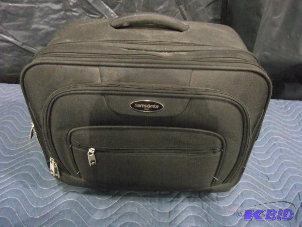 lot 60 image: Small Samsonite &quotCarry On" Suit Cas...