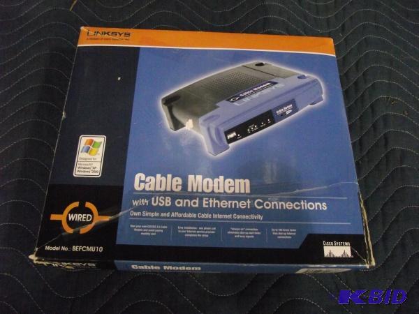 lot 63 image: Cable Modem   Model MEFCMU10 ...
