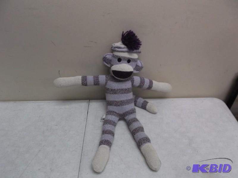 lot 61 image: Purple Sock Monkey -Has Some Light Wear...