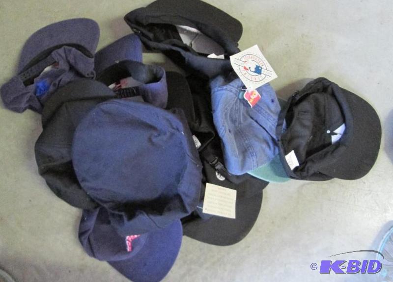 lot 112 image: lot of assorted hats full shopping bag...