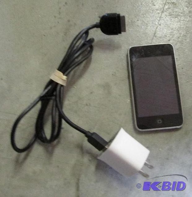 lot 116 image: 8GB ipod touch with a charger cracked screen...