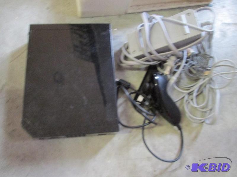 lot 120 image: Wii system with no remots, one numchuck used...
