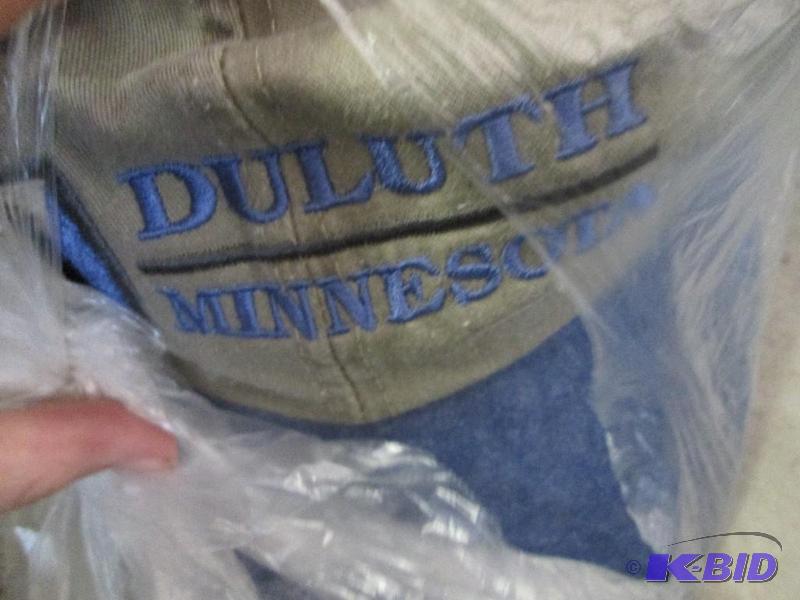 lot 170 image: Large lot of hats, 12 all green Duluth Minnes...