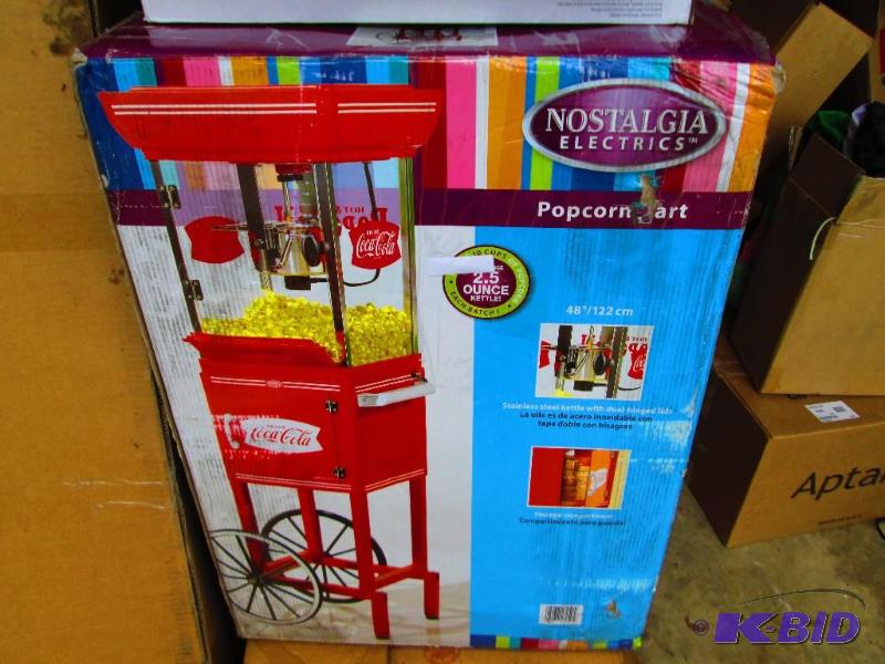 lot 40 image: Nostalgia electronics popcorn stand on wheels...