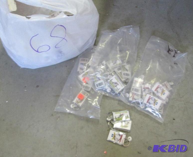 lot 68 image: mixed lof of souvenir Minnesota key chains...