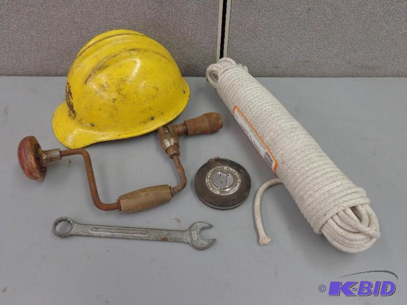 lot 65 image: Hardhat, Cord, Tape Measure and More Hardboil...
