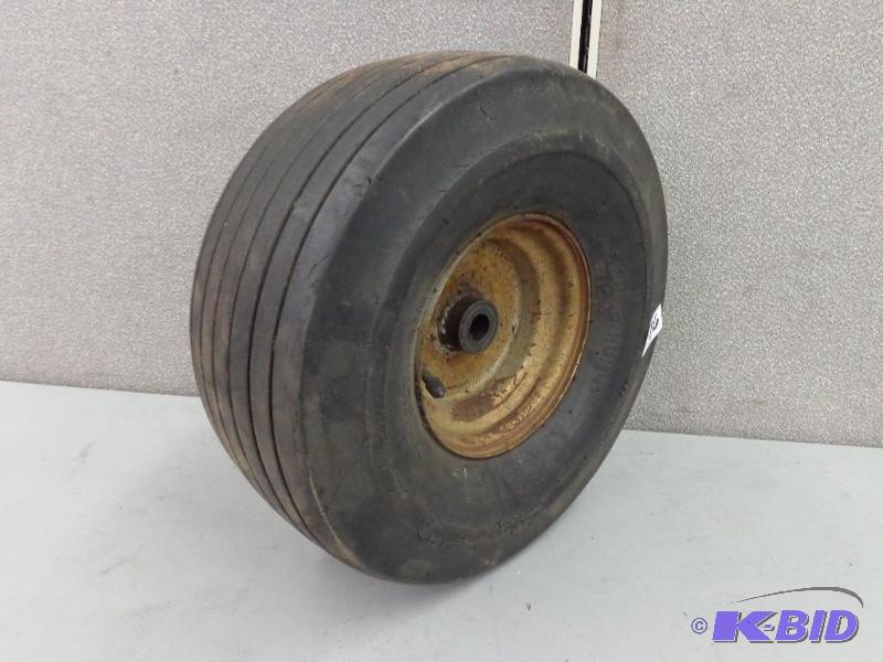 lot 76 image: Armstrong 15 x 6100-6 Multi-Ply Tire On 6.5&q...