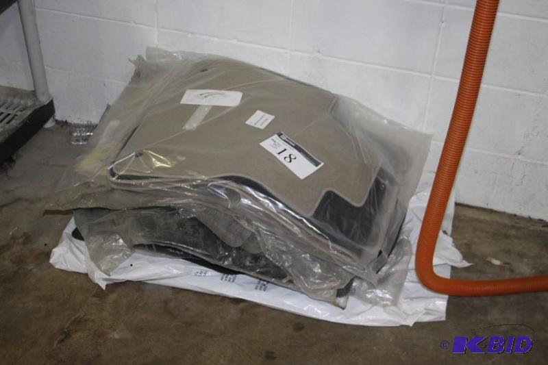 Lot of various car floor mats including grey,...
