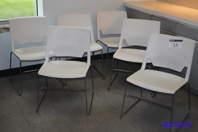 (6) White poly stackable chairs...