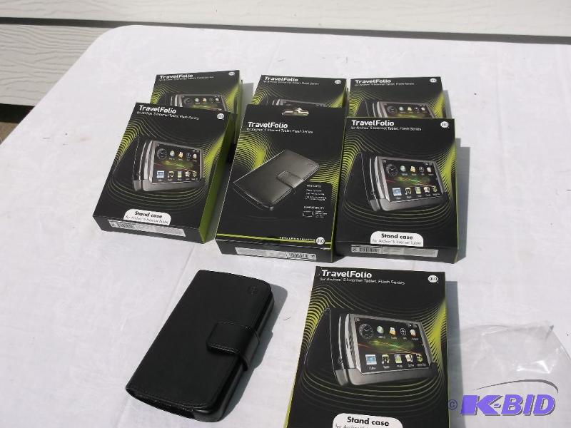 lot 52 image: Lot with 7 Travel Folio Archos 5 Internet Tab...