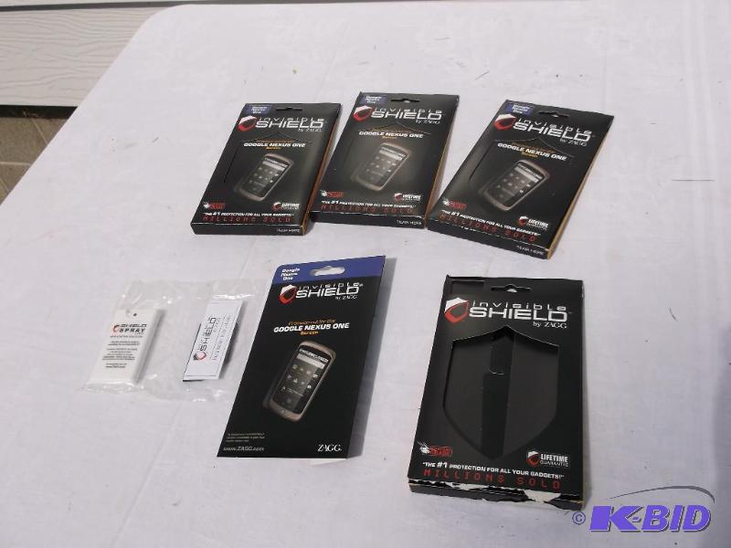 lot 54 image: Box with 4 Phone shields or us on other gadge...
