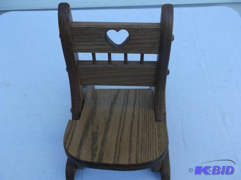 lot 66 image: Cute solid oak Doll chair appears in great co...