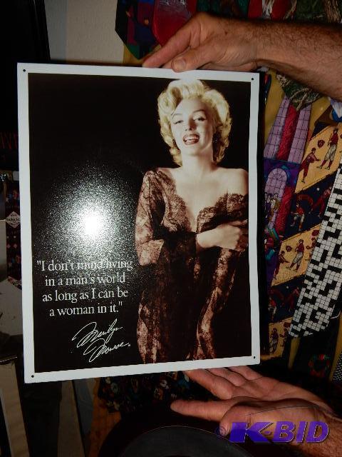 lot 79 image: METAL Marilyn Monroe poster with WORDS OF WIS...