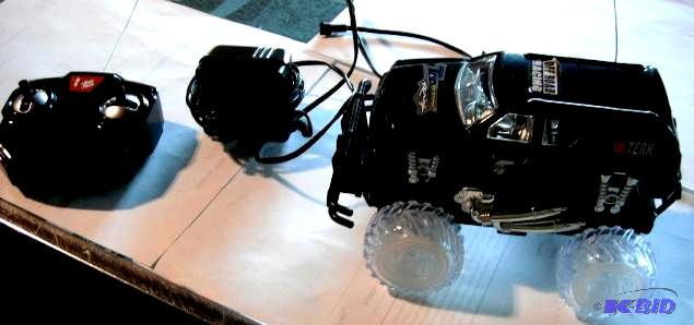 lot 25 image: Racing Rocket - Black SUV - Has LED lights in...