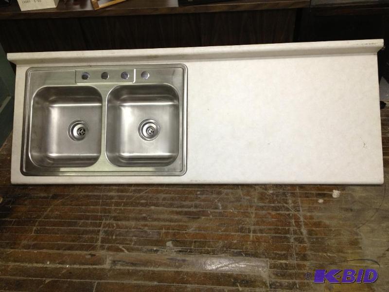 New Kitchen Sink with kitchen countertop. Cou...