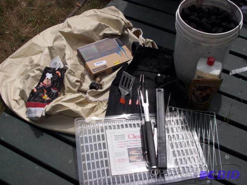 lot 11 image: 2 grill covers, grill accessories, grates, charcoal.