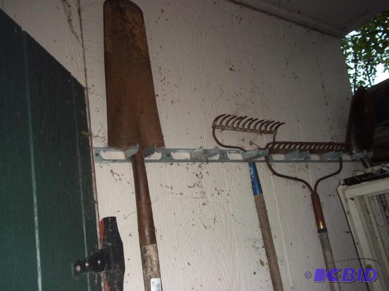 lot 127 image: 2 garden rakes and 2 shovels