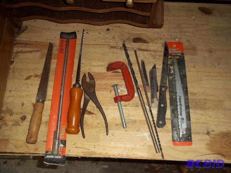 lot 209 image: 2 saw, plyers, c clamp, drill bits, saw blades, drill bit extension