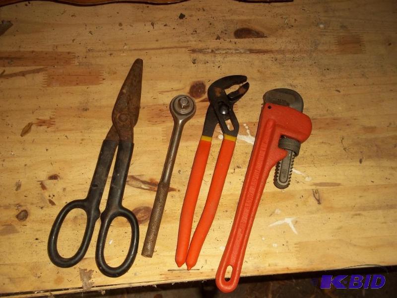 lot 215 image: tin snips, ratchet, channel lock, pipe wrench
