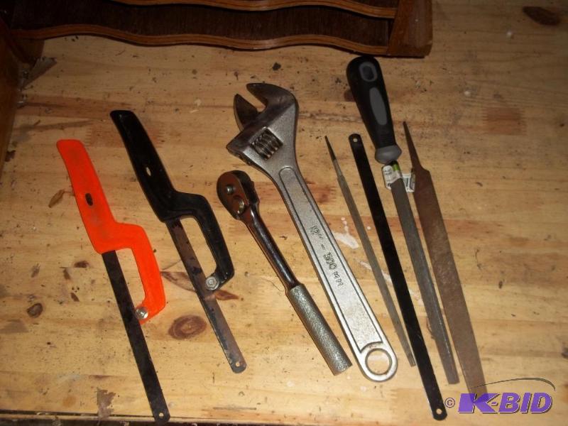 lot 217 image: 12 inch adjustable wrench, ratchet, 2 hack saws, files,