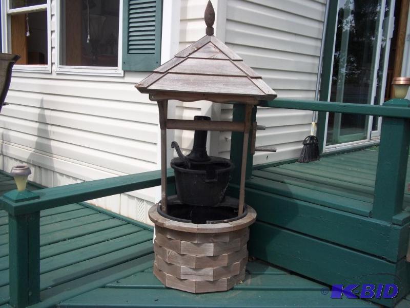 lot 22 image: wood wishing well with pump